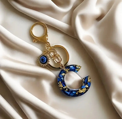 Porte clé initial en résine