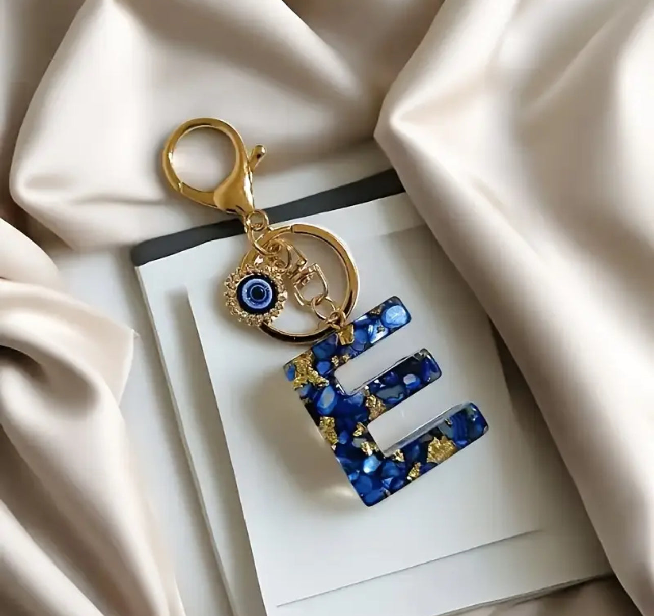 Porte clé initial en résine